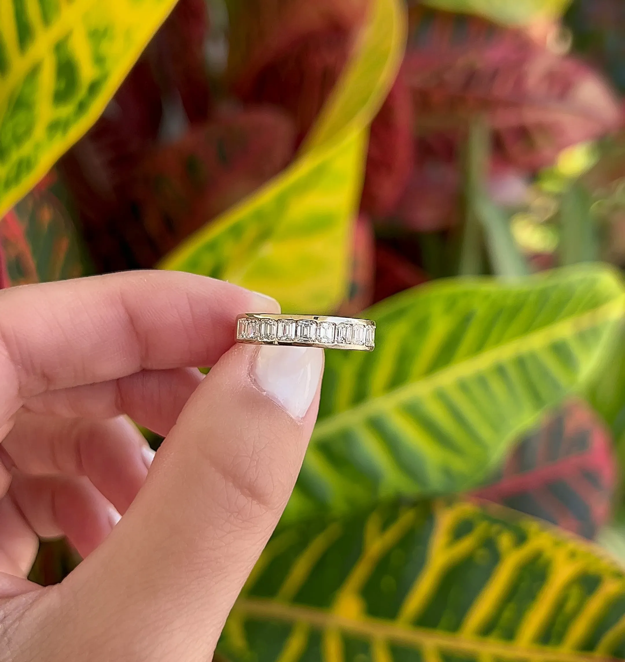Channel Set Emerald Diamond Band