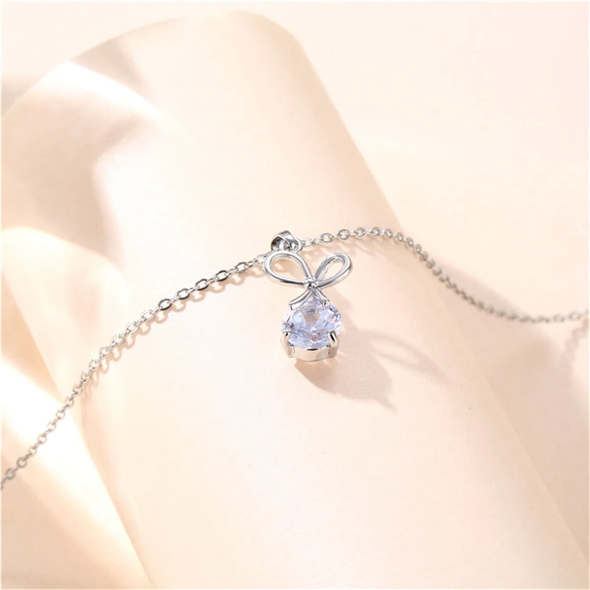 Crystal & Silver-Plated Bow Pendant Necklace