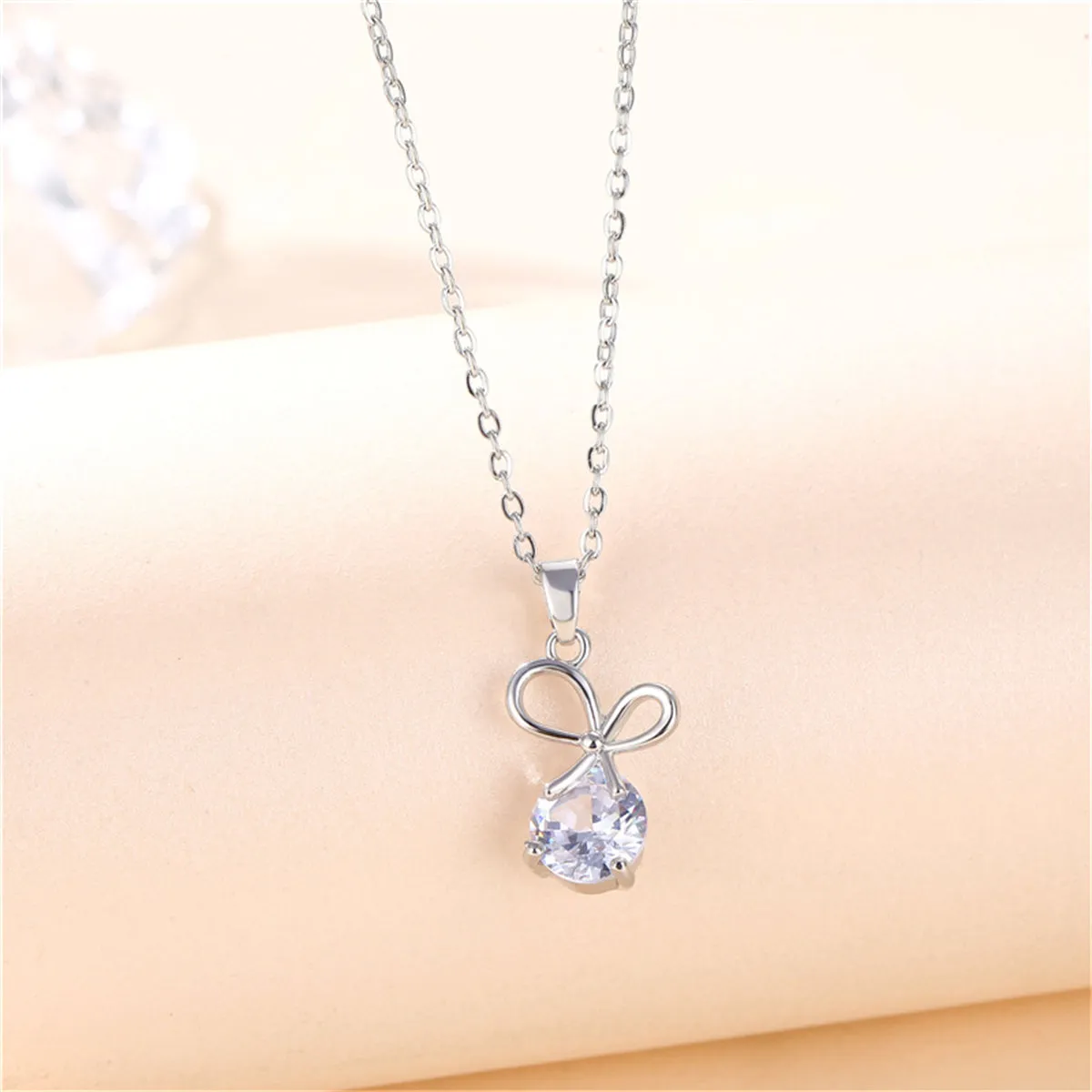 Crystal & Silver-Plated Bow Pendant Necklace