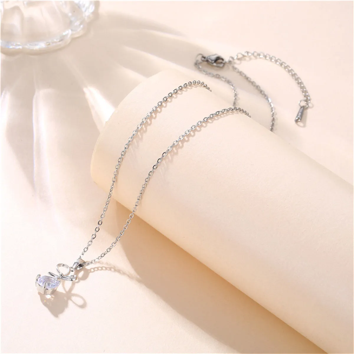 Crystal & Silver-Plated Bow Pendant Necklace
