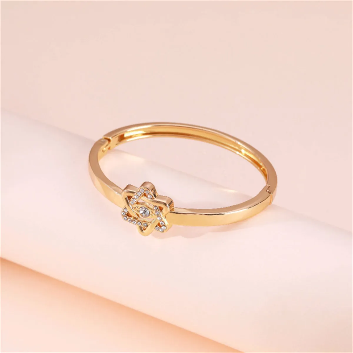 Cubic Zirconia & 18K Gold-Plated Flush-Set Openwork Star Hinge Bangle