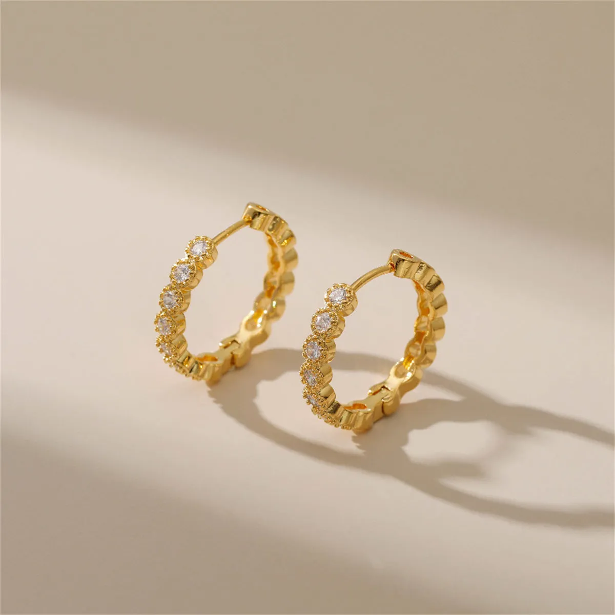 Cubic Zirconia & 18K Gold-Plated Round-Cut Bezel Wave Huggie Earrings