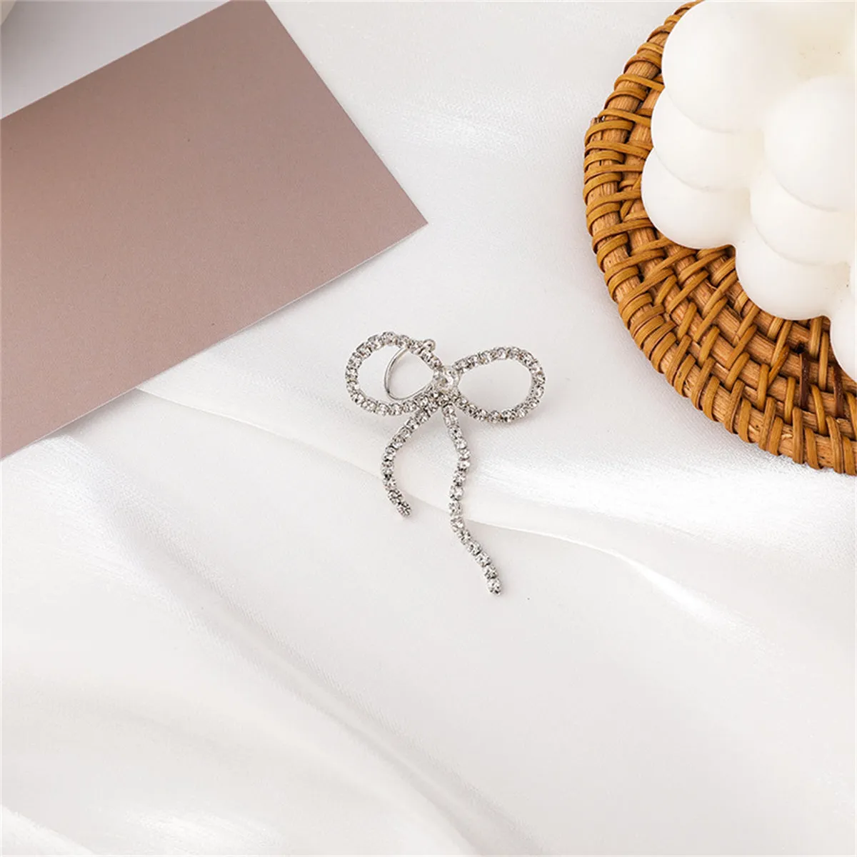 Cubic Zirconia & Silver-Plated Bow Ribbon Ear Cuff