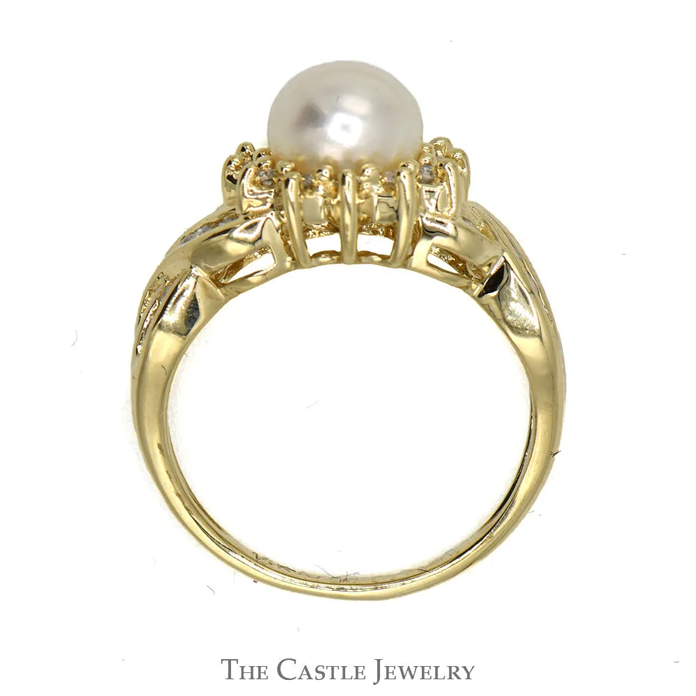 Pearl And Diamond Ring With .25CTTW Round Diamonds In Halo And Crossover Design Sides In 14KT Yellow Gold