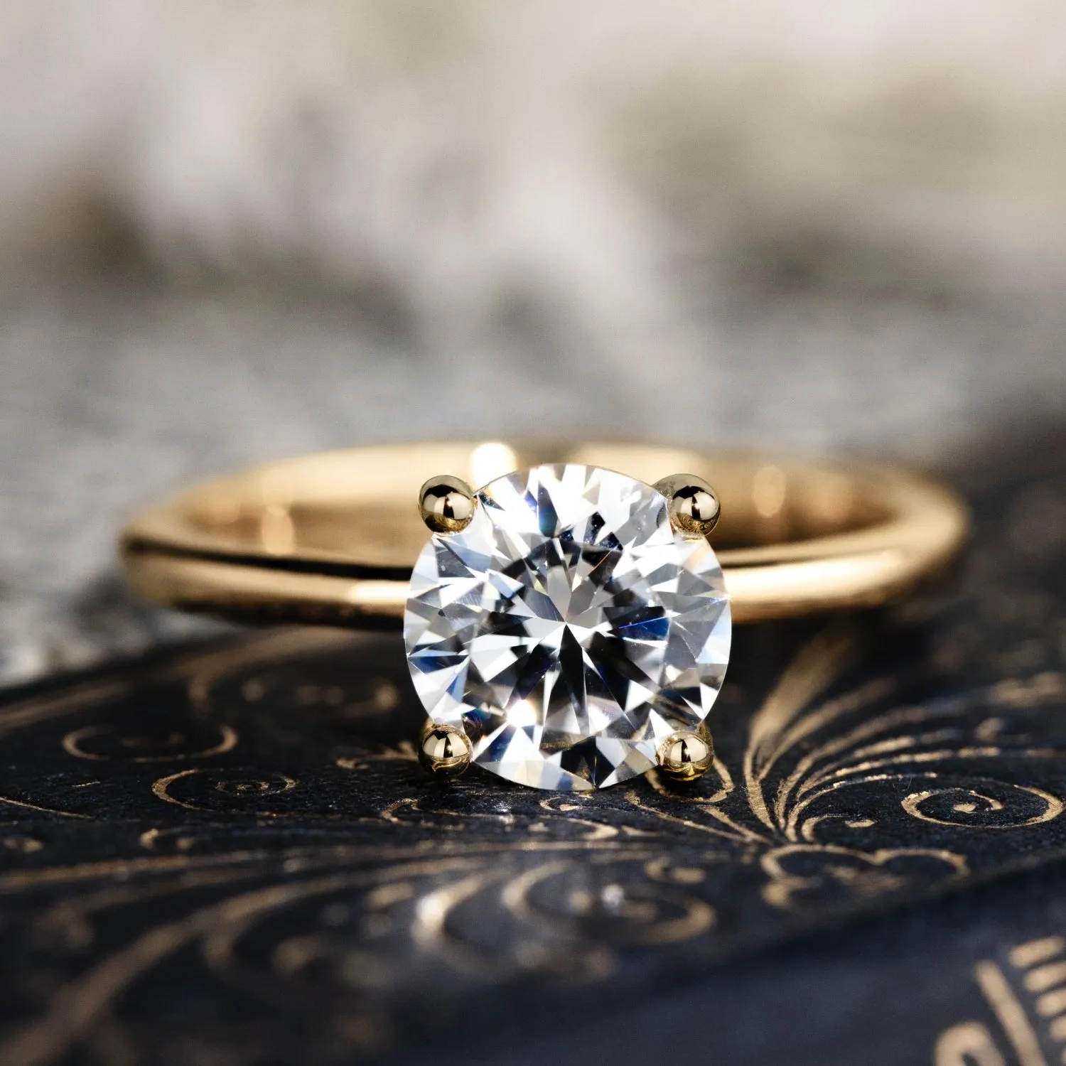 The Lora - Round Solitaire Engagement Ring with Delicate Nature Inspired Setting