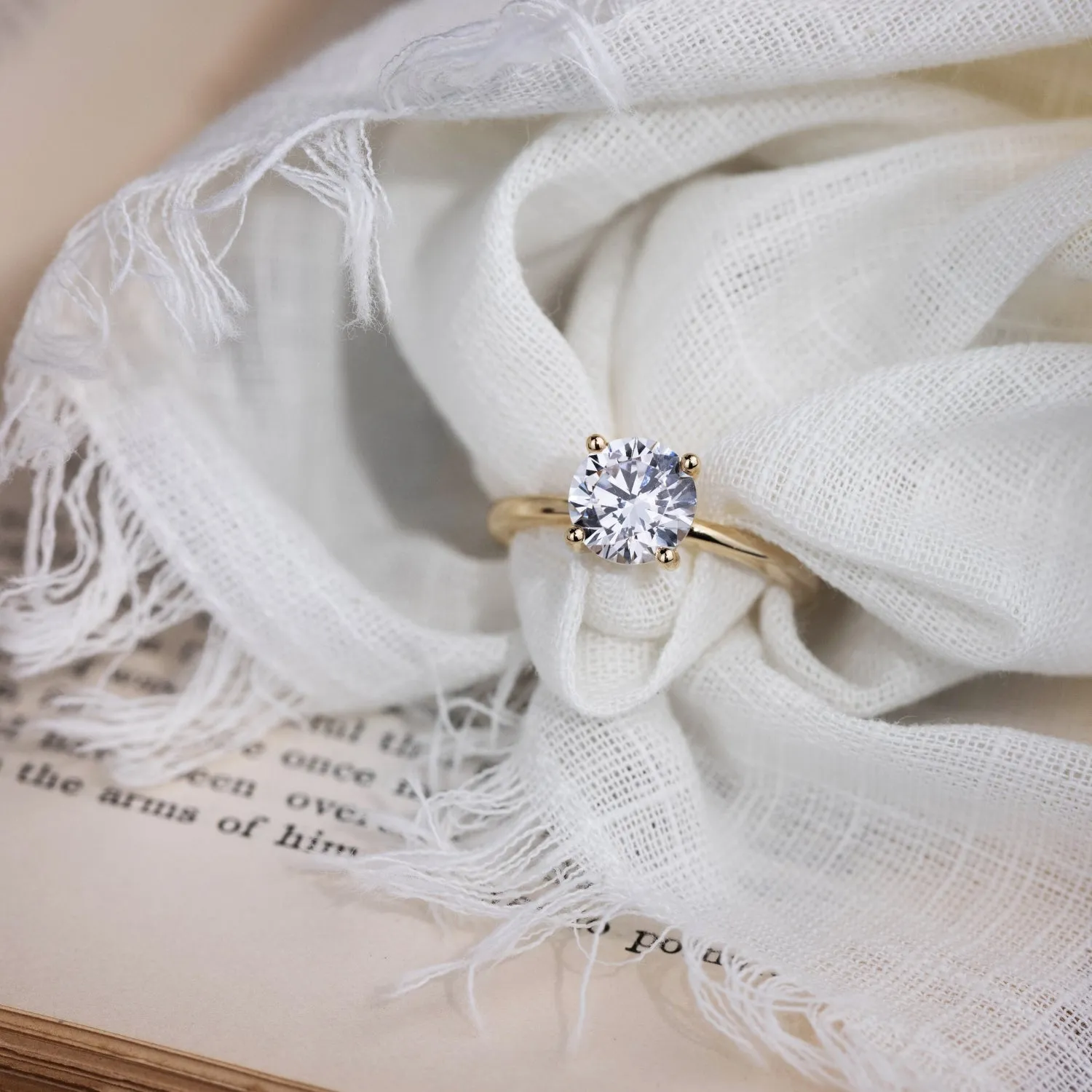 The Lora - Round Solitaire Engagement Ring with Delicate Nature Inspired Setting
