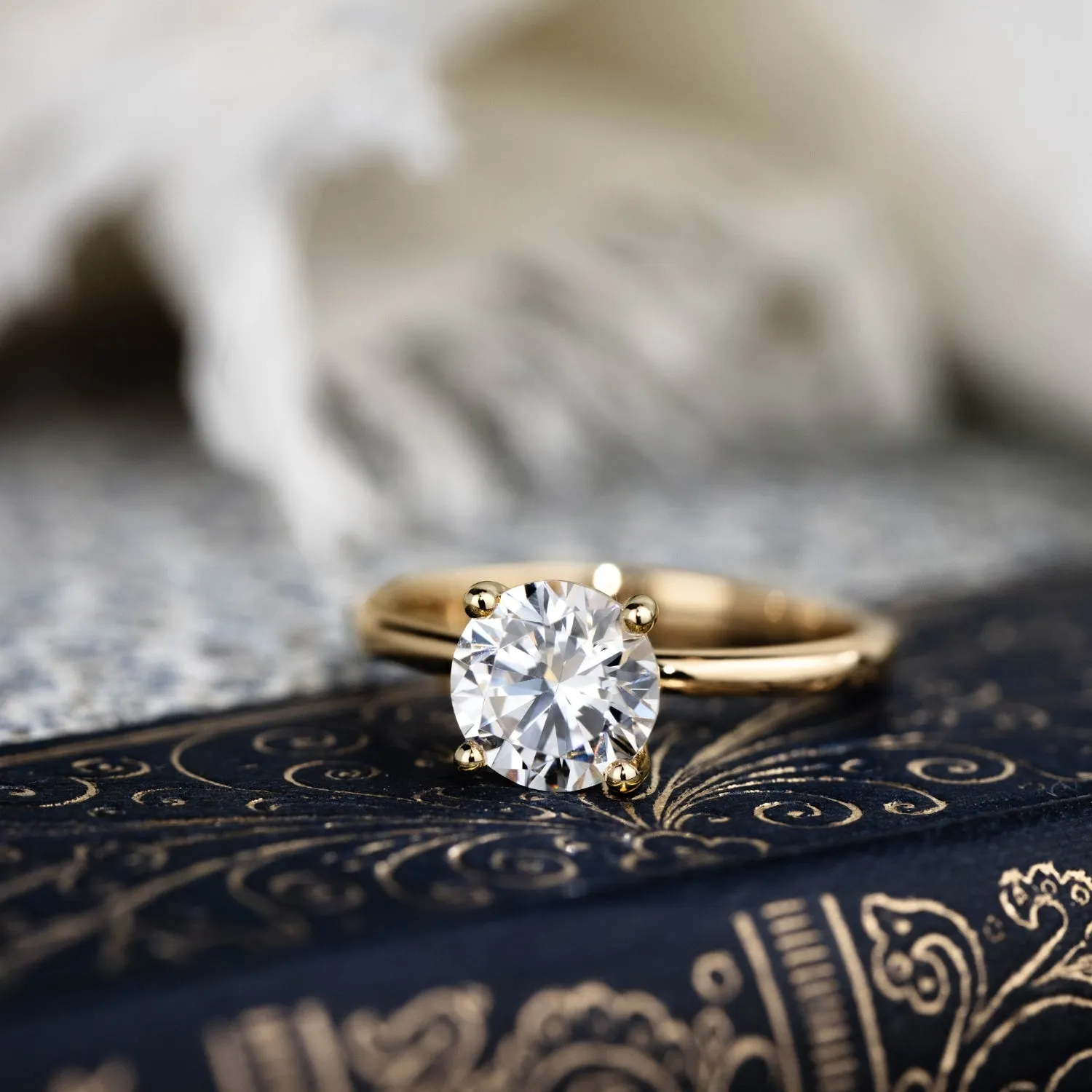 The Lora - Round Solitaire Engagement Ring with Delicate Nature Inspired Setting