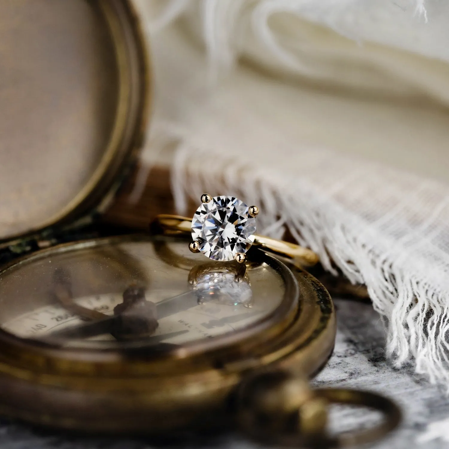 The Lora - Round Solitaire Engagement Ring with Delicate Nature Inspired Setting