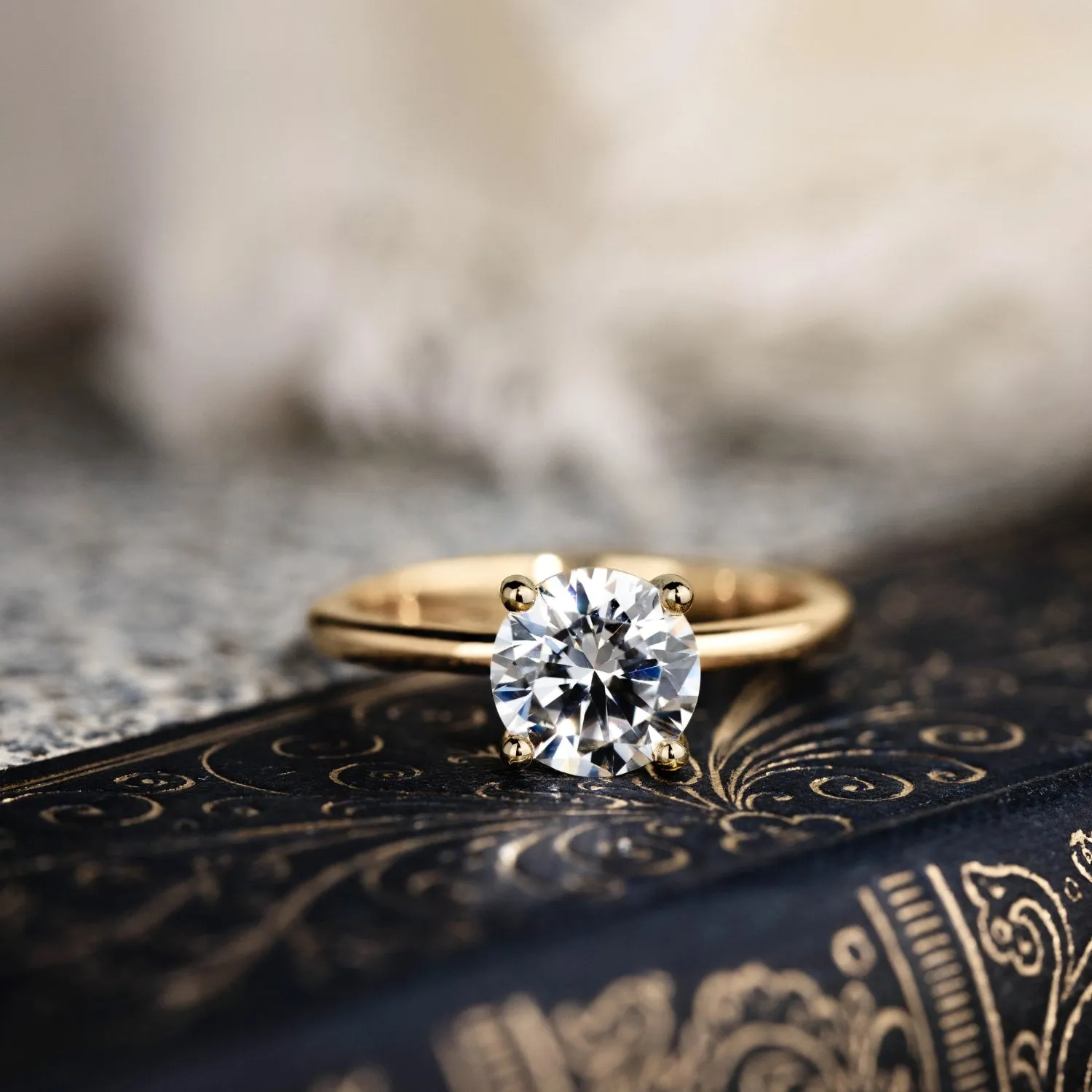 The Lora - Round Solitaire Engagement Ring with Delicate Nature Inspired Setting
