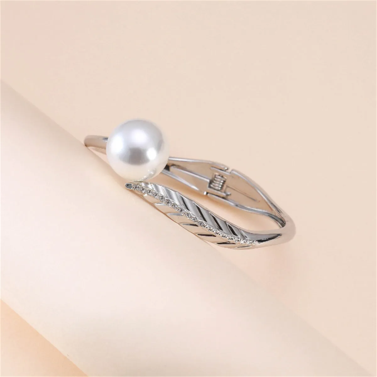 White Pearl & Cubic Zirconia Silver-Plated Leaf Hinge Bangle