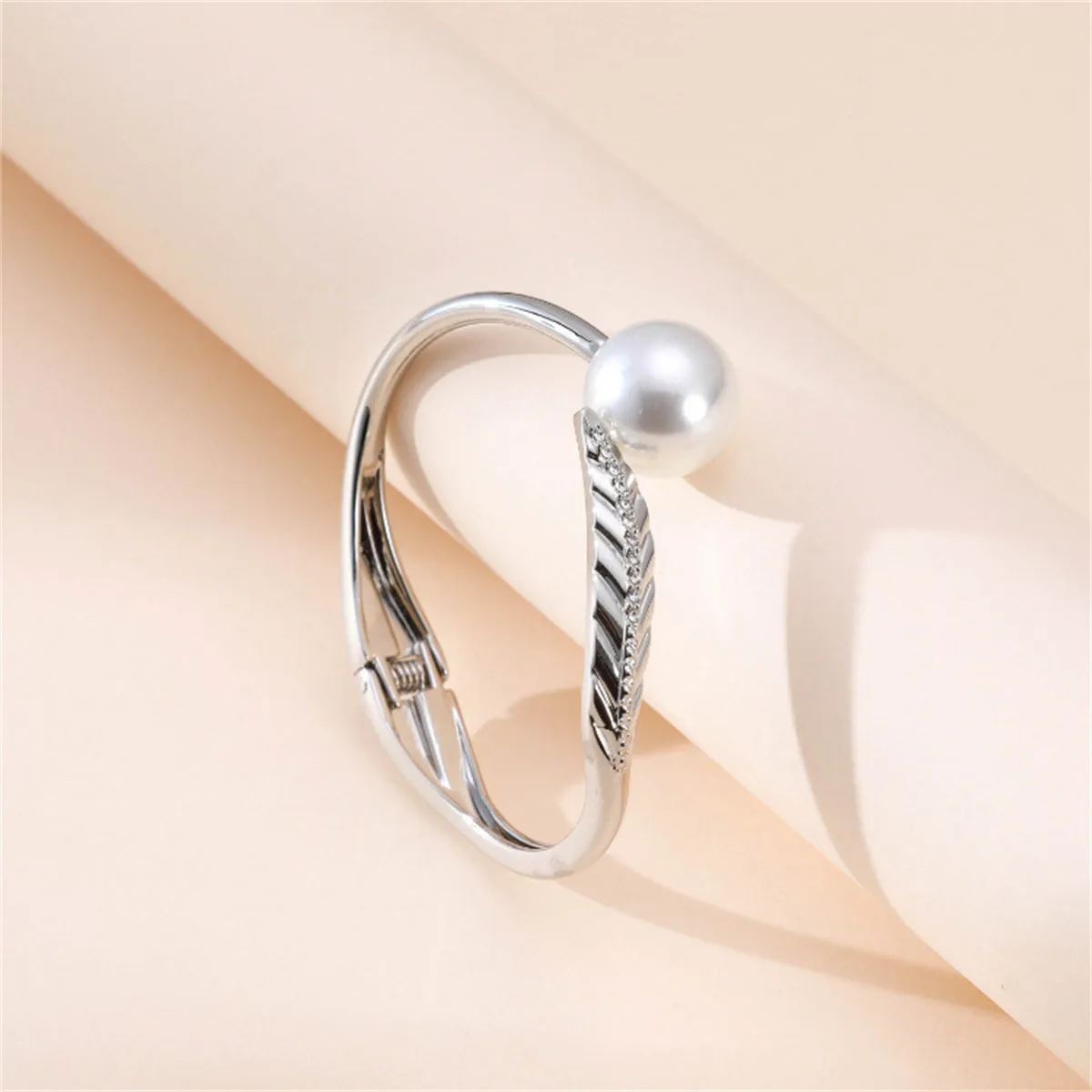 White Pearl & Cubic Zirconia Silver-Plated Leaf Hinge Bangle
